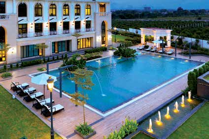Sunset Dream Package evening pool view at Prestige Park Drive